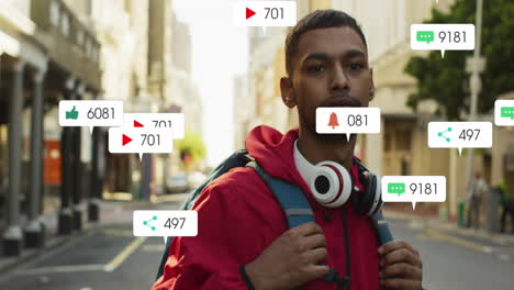 Animation-of-changing-numbers,-icons-in-notification-bars-over-biracial-man-standing-on-street