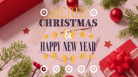Animation-of-merry-christmas-and-happy-new-year-text-over-baubles,-gift-boxes-and-leaves