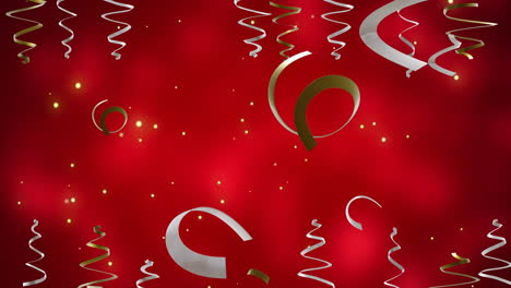 Animation-of-gold-and-silver-party-streamers-over-red-background