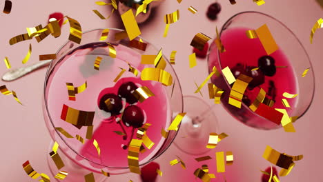 Animation-of-confetti-falling-and-cocktail-on-pink-background