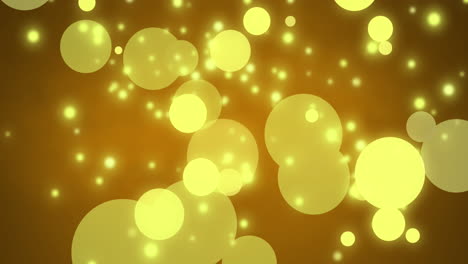 Animation-of-yellow-glowing-spots-falling-on-yellow-background