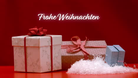 Animation-of-frohe-weihnachten-text-over-gifts-on-red-background