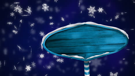 Animation-of-snow-falling-over-blue-sign-with-copy-space-on-blue-background