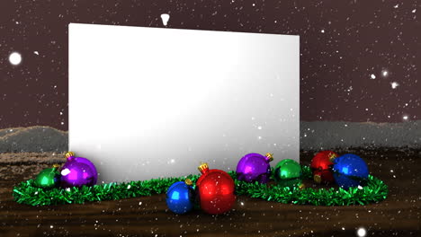 Animation-of-snow-falling-over-white-card-with-copy-space-and-christmas-decorations