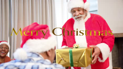 Animation-of-merry-christmas-text-over-diverse-senior-friends-with-santa-at-christmas-at-home