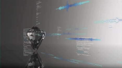 Animation-of-computer-language,-soundwaves-over-rotating-diamond-on-surface