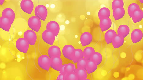 Animation-of-pink-balloons-going-up-over-yellow-light-orbs-on-yellow-background