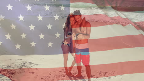 Animation-of-flag-of-usa-over-caucasian-couple-on-beach-in-summer