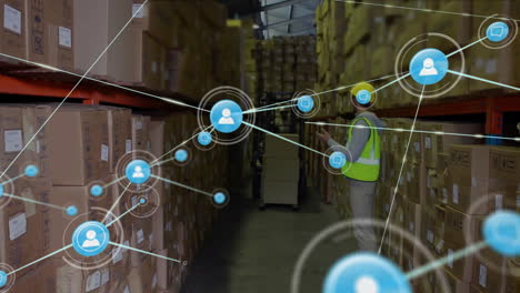Animation-of-network-of-connections-over-caucasian-man-working-in-warehouse