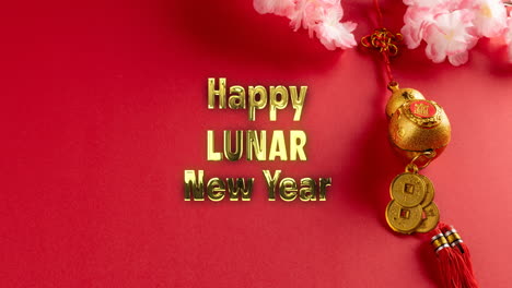 Animation-of-happy-lunar-new-year-ext-over-chinese-pattern-on-red-background
