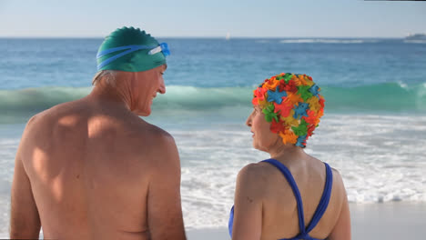 Elderly-couple-running-to-the-sea
