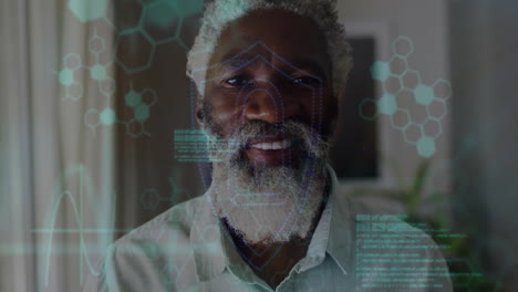 Animation-of-data-processing-over-happy-senior-african-american-man-at-home