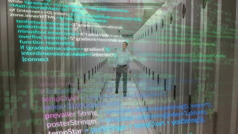 Animation-of-computer-language-over-caucasian-male-engineer-walking-in-data-server-room