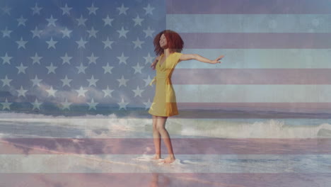 Animation-of-american-flag-and-clouds-over-african-american-woman-dancing-on-sunny-beach