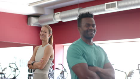 Fit-young-Caucasian-woman-and-African-American-man-at-the-gym