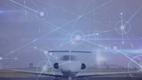 Animation-of-lens-flares-and-connected-dots-over-parked-airplane-against-sky-in-airport