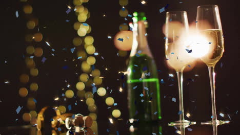 Animation-of-confetti-falling-over-champagne-glasses-and-bottle