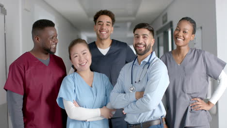 Diverse-medical-team-smiling-in-a-hospital-corridor