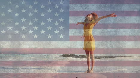 Animation-of-american-flag-and-clouds-over-african-american-woman-dancing-on-sunny-beach