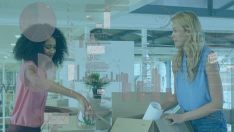 Animation-of-financial-data-processing-over-diverse-businesswomen-unpacking-boxes-in-office