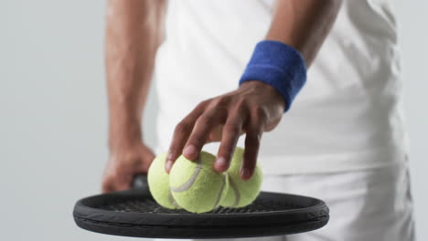 Athlete-preparing-to-serve-in-a-tennis-match