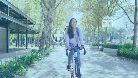 Animation-of-financial-data-processing-with-icons-over-biracial-woman-riding-bike