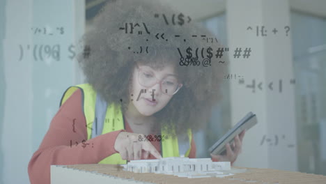 Animation-of-data-processing-over-biracial-female-engineer-in-hi-vis-vest-with-3d-building-model