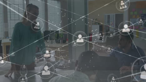Animation-of-network-of-connections-over-diverse-business-people-in-office