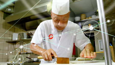 Animation-of-network-of-connections-over-asian-male-chef-making-sushi