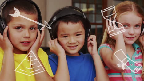 Animation-of-school-icons-over-diverse-schoolchildren-using-headphones-in-classroom