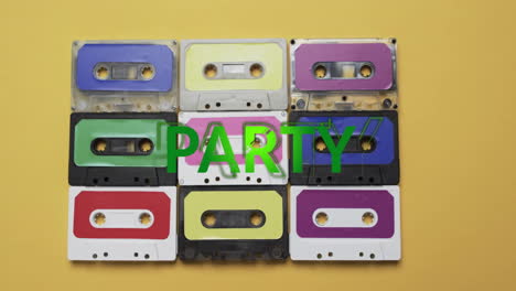 Animation-of-party-text-over-tape-on-yellow-background