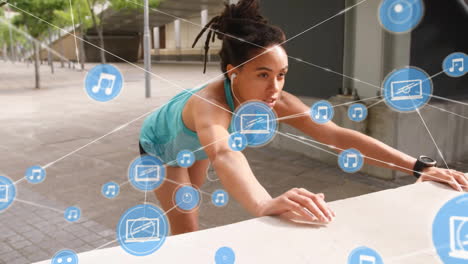 Animation-of-network-of-connections-with-icons-over-biracial-woman-exercising