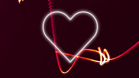Animation-of-social-media-heart-icon-over-glowing-lights-over-dark-background