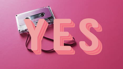 Animation-of-yes-text-over-tape-on-pink-background