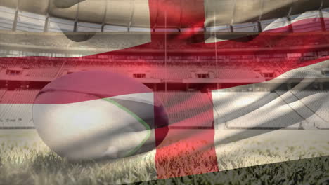 Animation-of-waving-flag-of-england-over-stadium-with-rugby-ball