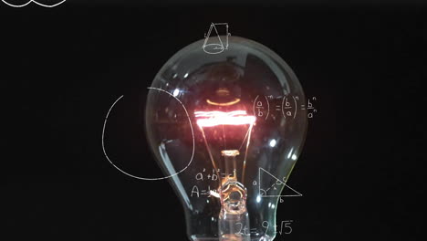 Animation-of-lit-light-bulb-over-mathematical-data-processing