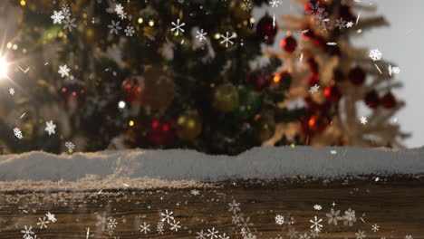 Animation-of-snow-falling-over-christmas-tree-with-copy-space