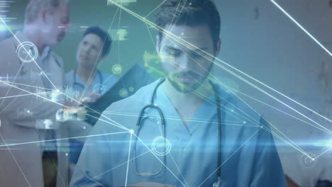 Animation-of-network-of-connections-with-data-processing-over-caucasian-male-doctor-in-hospital