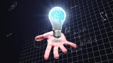 Animation-of-light-bulb-with-brain-over-woman's-hand-and-mathematical-data-processing