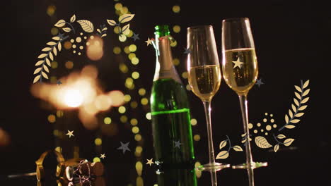 Animation-of-sparkler-over-champagne-glasses-and-bottle