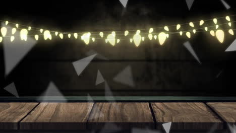 Animation-Fallender-Dreiecke-über-Weihnachtlicher-Lichterkette