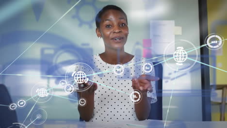 Animation-of-network-of-connections-over-african-american-businesswoman-in-office