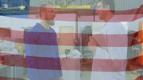 Animation-of-flag-of-usa-over-caucasian-engineers-in-laboratory