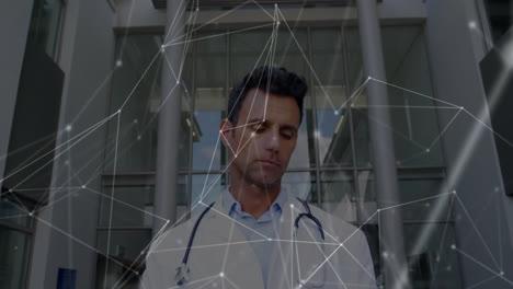 Animation-of-network-of-connections-with-data-processing-over-biracial-male-doctor-in-hospital