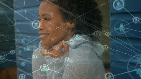 Animation-of-network-of-connections-over-african-american-woman-smiling