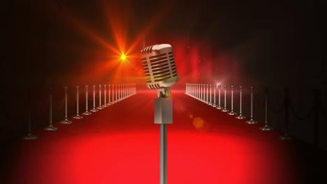 Animation-of-retro-microphone-between-crowd-barriers-and-flashing-lights-on-red-background