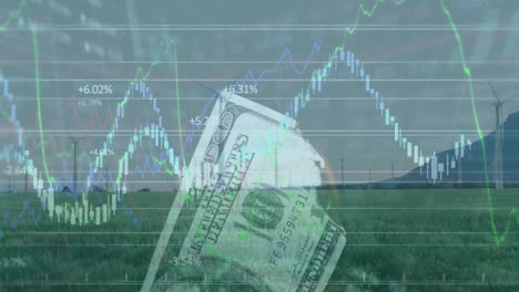 Animation-of-graphs,-trading-board-and-burning-100-dollar-bill-over-windmills-on-grassy-landscape