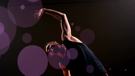 Animation-of-caucasian-basketball-player-throwing-ball-and-spots-of-light-on-black-background