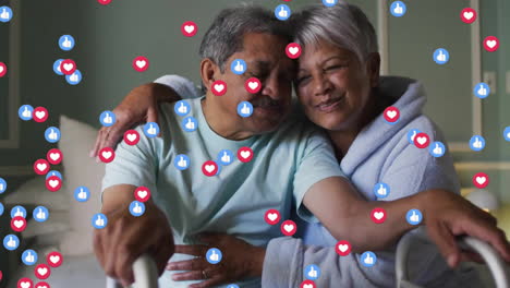 Animation-of-social-media-icons-over-senior-biracial-couple-embracing