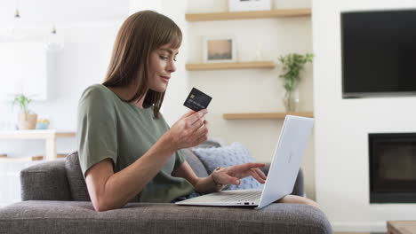 Middle-aged-Caucasian-woman-shops-online-from-home